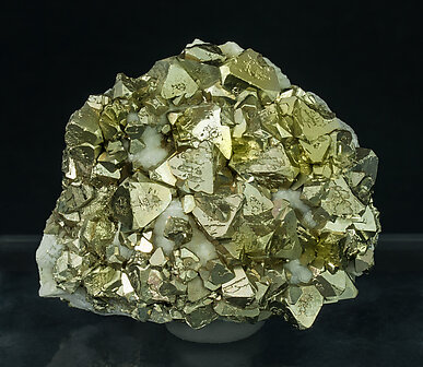 Pyrite (octahedral) with Calcite-Dolomite and Ferberite.