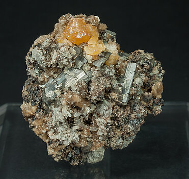 Scheelite with Arsenopyrite, Cassiterite, Muscovite and Quartz. 