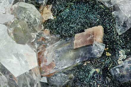 Quartz with Dolomite (variety Fe-bearing dolomite) and Chlorite. 