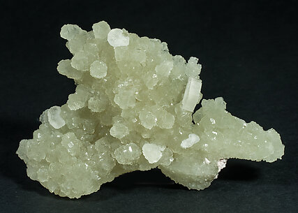 Prehnite with Calcite and Orthoclase.