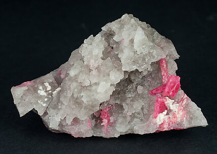 Zoisite (variety thulite) with Quartz. 