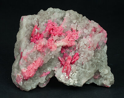 Zoisite (variety thulite) with Quartz. 