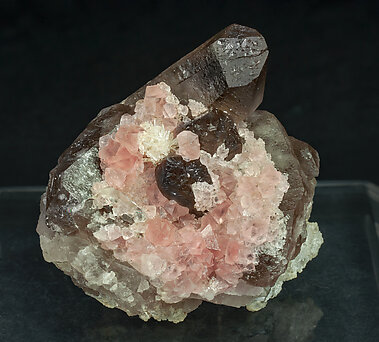 Fluorite (octahedral) with Milarite and Quartz (variety smoky quartz). 