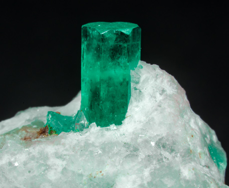 Beryl (variety emerald) with Calcite and Quartz. 