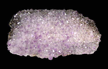 Quartz (variety amethyst) after Calcite with Hematite.