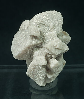 Calcite with sand inclusions.