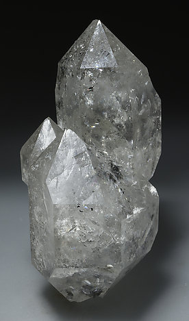 Doubly terminated Quartz with inclusions of hydrocarbons. 