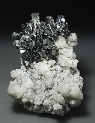 Stibnite, Calcite.