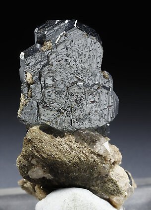 Hematite, Quartz (smoky variety). 