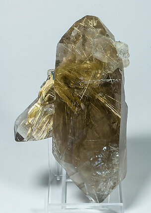 Quartz with Rutile inclusions.