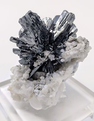 Stibnite, Calcite.