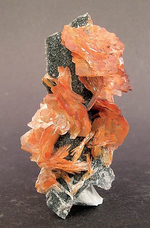 Realgar included in Baryte. 