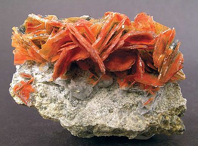 Realgar included in Baryte. 