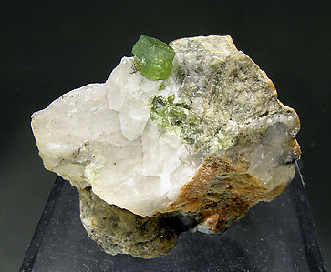 Andradite (variety demantoid chromium rich).