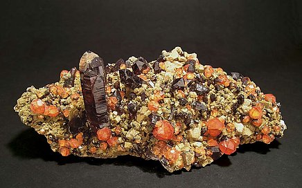 Spessartine with smoky Quartz and Clinochlore.