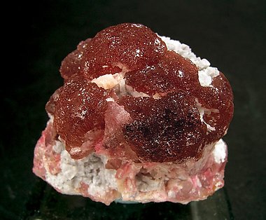 Elbaite (variety rubellite) with Quartz.