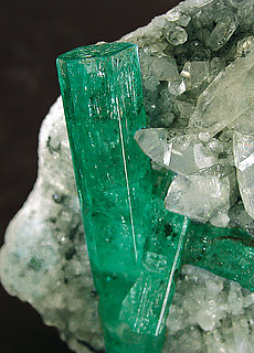 Beryl (variety emerald) on Calcite. 