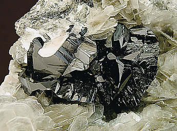Fluorapatite with Cassiterite and Mica. 