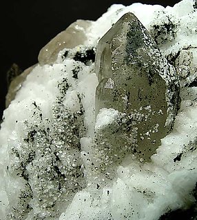 Albite with Bavenite and Smoky Quartz. 