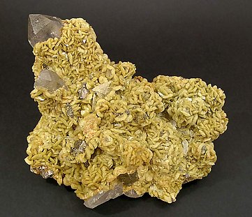 Siderite with Quartz and Arsenopyrite.