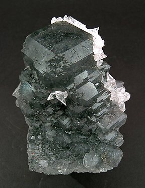 Fluorite with Calcite and Jamesonite inclusions.