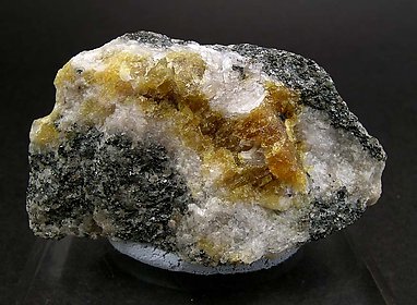 Berzeliite with Hausmannite.