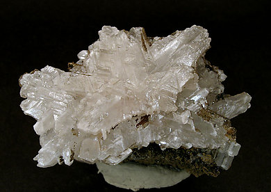 Cerussite on Quartz with Goethite inclusions.