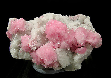 Rhodochrosite on Quartz.