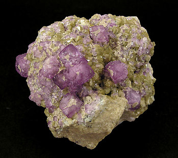 Fluorite on Siderite.