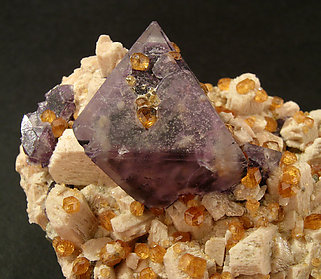 Octahedral Fluorite on Orthoclase and Spessartine. 