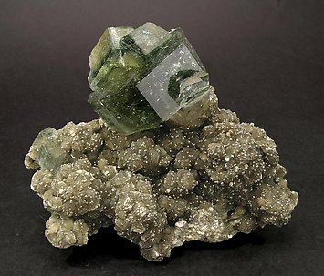 Fluorapatite with Muscovite and Quartz.