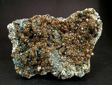 Andradite (variety topazolite) with Clinochlore.