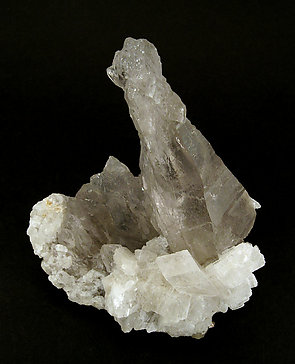 Ba-rich Microcline (variety hyalophane) on Quartz (variety smoky). 