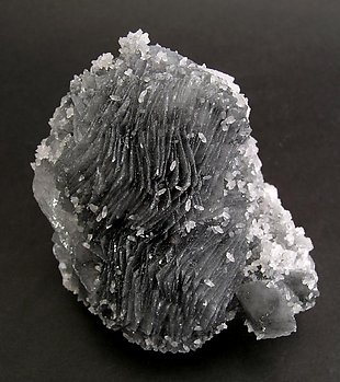 Calcite with Boulangerite inclusions. Rear