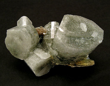 Fluorapatite with Muscovite, Pyrite and Siderite. 