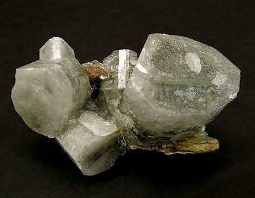 Fluorapatite with Muscovite, Pyrite and Siderite.