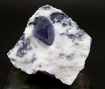 Benitoite on Natrolite.