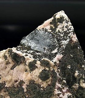 Nagygite on Rhodochrosite. 