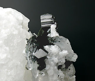 Babingtonite with Calcite and Quartz. 