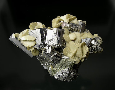 Arsenopyrite with Siderite and Chalcopyrite.