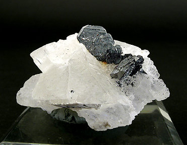 Hematite with Rutile and adularia. 
