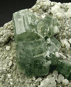 Fluorapatite with Calcite and Muscovite. 