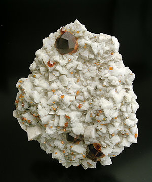 Spessartine with Feldspar and Mica. 