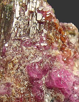 Painite with Corundum (variety ruby). 