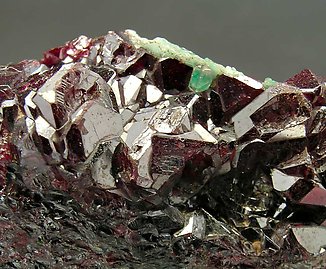 Cuprite with Malachite and Calcite. 