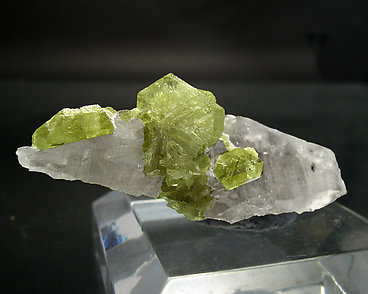 Twinned Chrysoberyl on smoky Quartz.