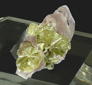 Twinned Chrysoberyl on smoky Quartz. Side