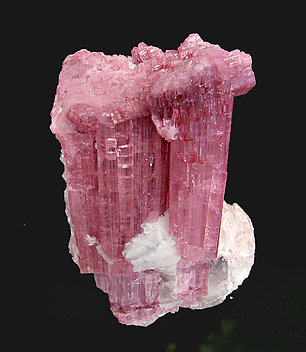 Elbaite (variedad rubellite) with Mica and Quartz. Side