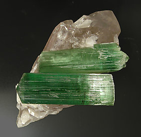 Elbaite (variety verdelite) on smoky Quartz. Side