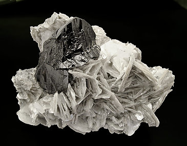 Cassiterite with Mica and Fluorite.